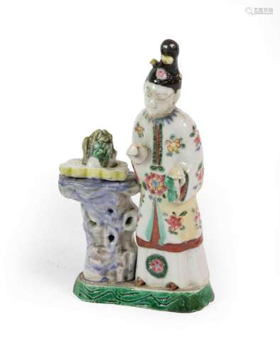 A Chinese Porcelain Figure of a Maiden, Qianlong, standing w...