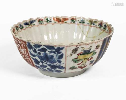 A Chinese Porcelain Bowl, Kangxi, of fluted circular form, p...