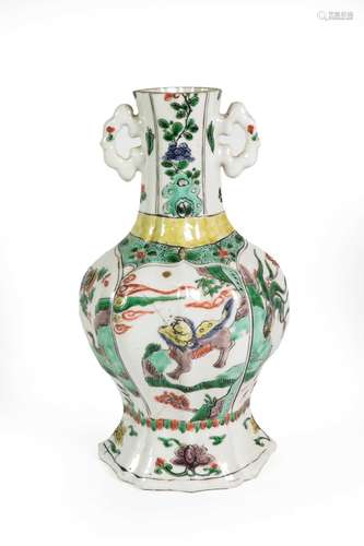 A Chinese Porcelain Vase, Kangxi, of fluted oval baluster fo...