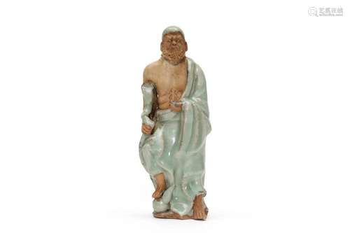 A Longquan Celadon Luohan Figure