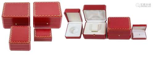 Four Cartier Boxes, each variously oblong shaped, with gilt-...