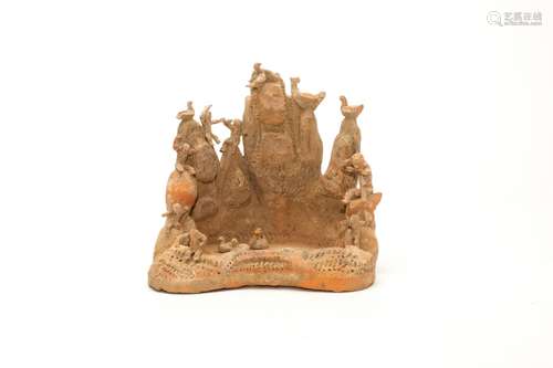 A Potery Figure of Roosters Monkeys and Fish Mountain