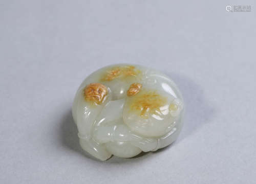 Carved White and Russet Jade Boy Ornament