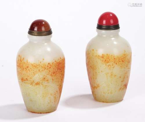 Pair of Chinese Nephrite Snuff Bottles with Skin