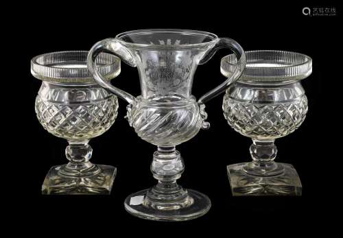 A Victorian Glass Coin Loving Cup, dated 1870, the thistle-s...