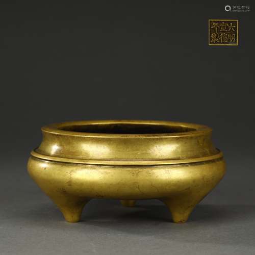 Ancient copper-gilded three-legged incense burner