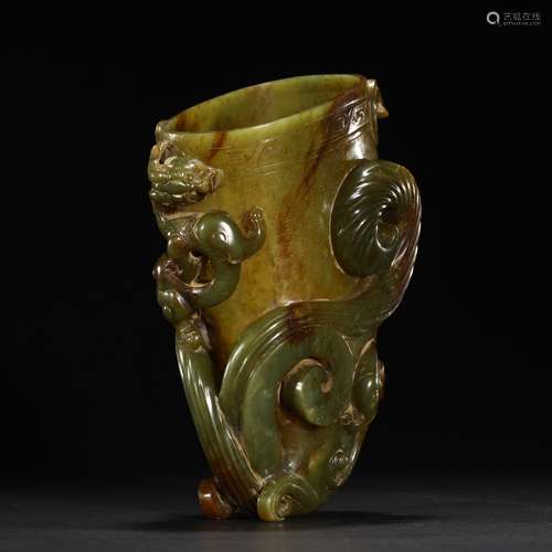 Ancient jade cup with red dragon pattern