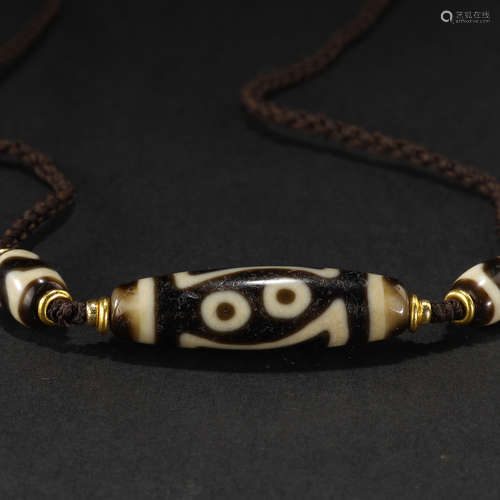 Ancient four-eyed celestial beads