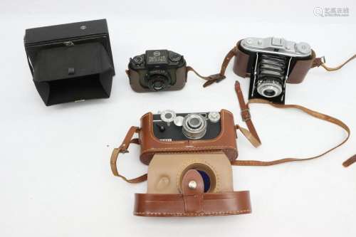 4 vintage cameras