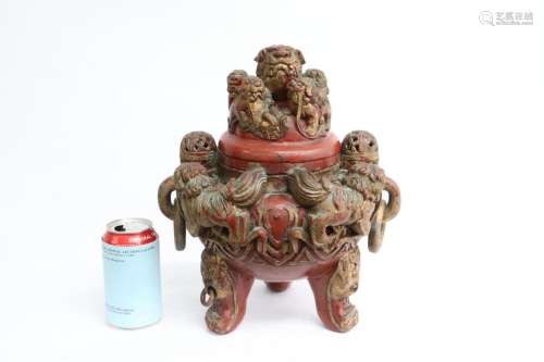 A painted and carved wood covered censer
