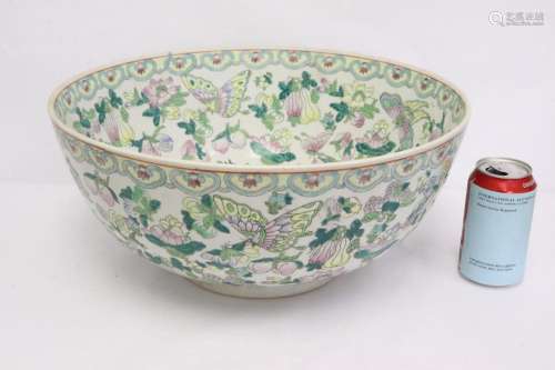 A massive famille rose porcelain bowl, drilled