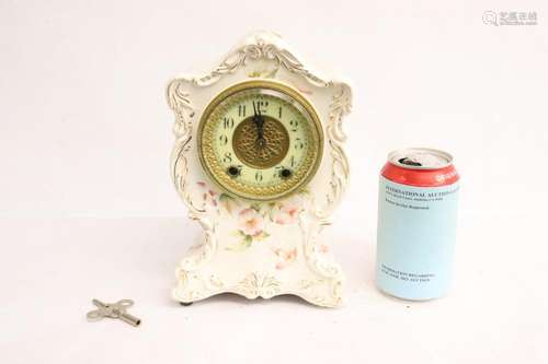 Antique porcelain cased keywind table clock