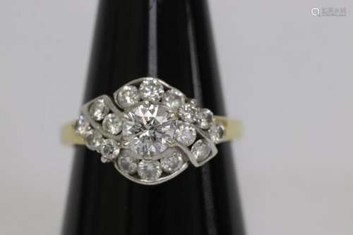 An 18K Y/G diamond ring