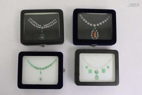 4 boxes of loose jadeite cabochon ensembles