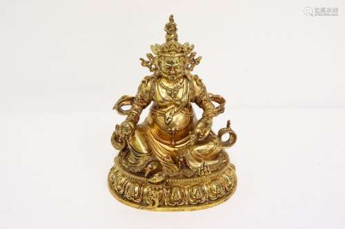 A Chinese gilt bronze sculpture of deity
