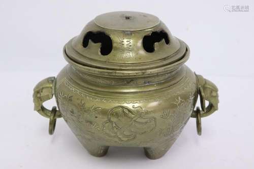 A brass covered censer