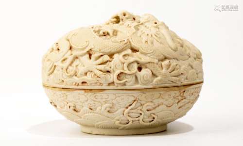 A PORCELAIN CARVED SEAL-PASTE BOX AND COVER. FEATURING
