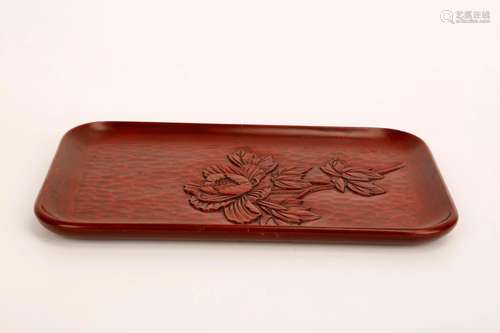 A JAPANESE CINNABAR LACQUER RECTANGLE PLATE CARVED WITH FLOW...