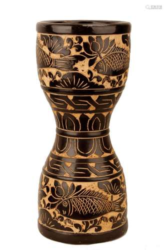 A CIZHOU BLACK GLAZED CARVED WITH LOTUS FLOWERS AND FISHES ,...