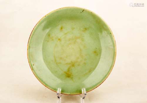 A YELLOWISH PEA GREEN GLAZE PORCELAIN DISH. THE BASE MARKED ...