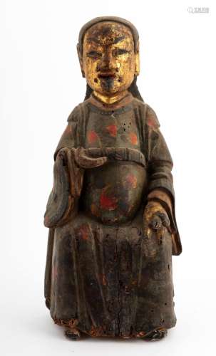 A GILT- LACQUERED WOOD FIGURE OF A DAOIST IMMORTAL