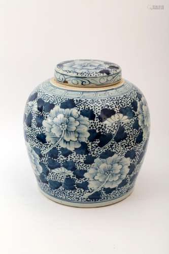 A BLUE AND WHITE PEONY JAR AND COVER