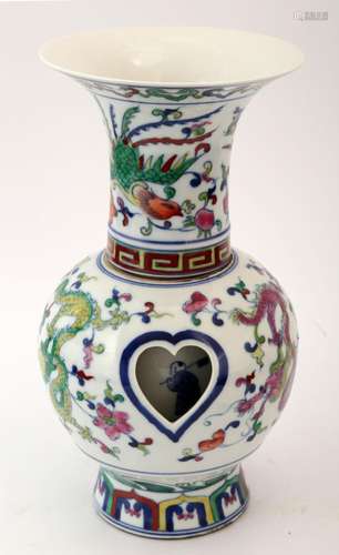 A FAMILLE ROSE FLOWERS ,BLUE AND WHIT REVOLVING VASE