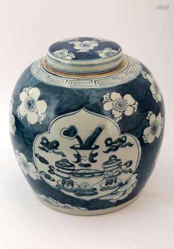 A BLUE AND WHITE BOGUTU JAR AND COVER