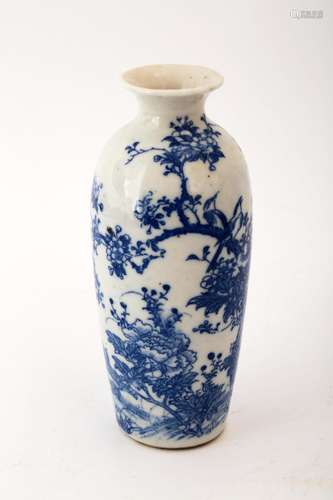 A SMALL BLUE AND WHITE FLOWERS AND BIRDS VASE.