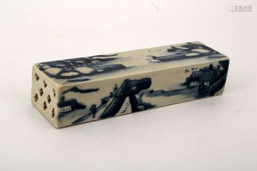 A BLUE AND WHITE LANDSCAPE PORCELAIN PAPER WEIGHT