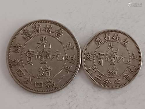 TWO CHINESE OLD SILVER COINS