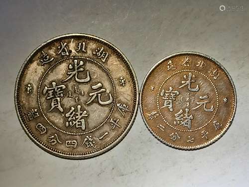 TWO CHINESE OLD SILVER COINS