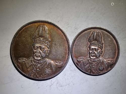 TWO CHINESE OLD SILVER COINS