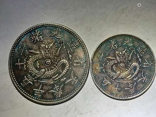 TWO CHINESE OLD SILVER COINS