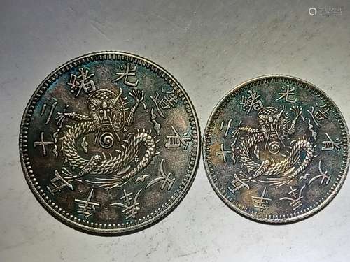 TWO CHINESE OLD SILVER COINS