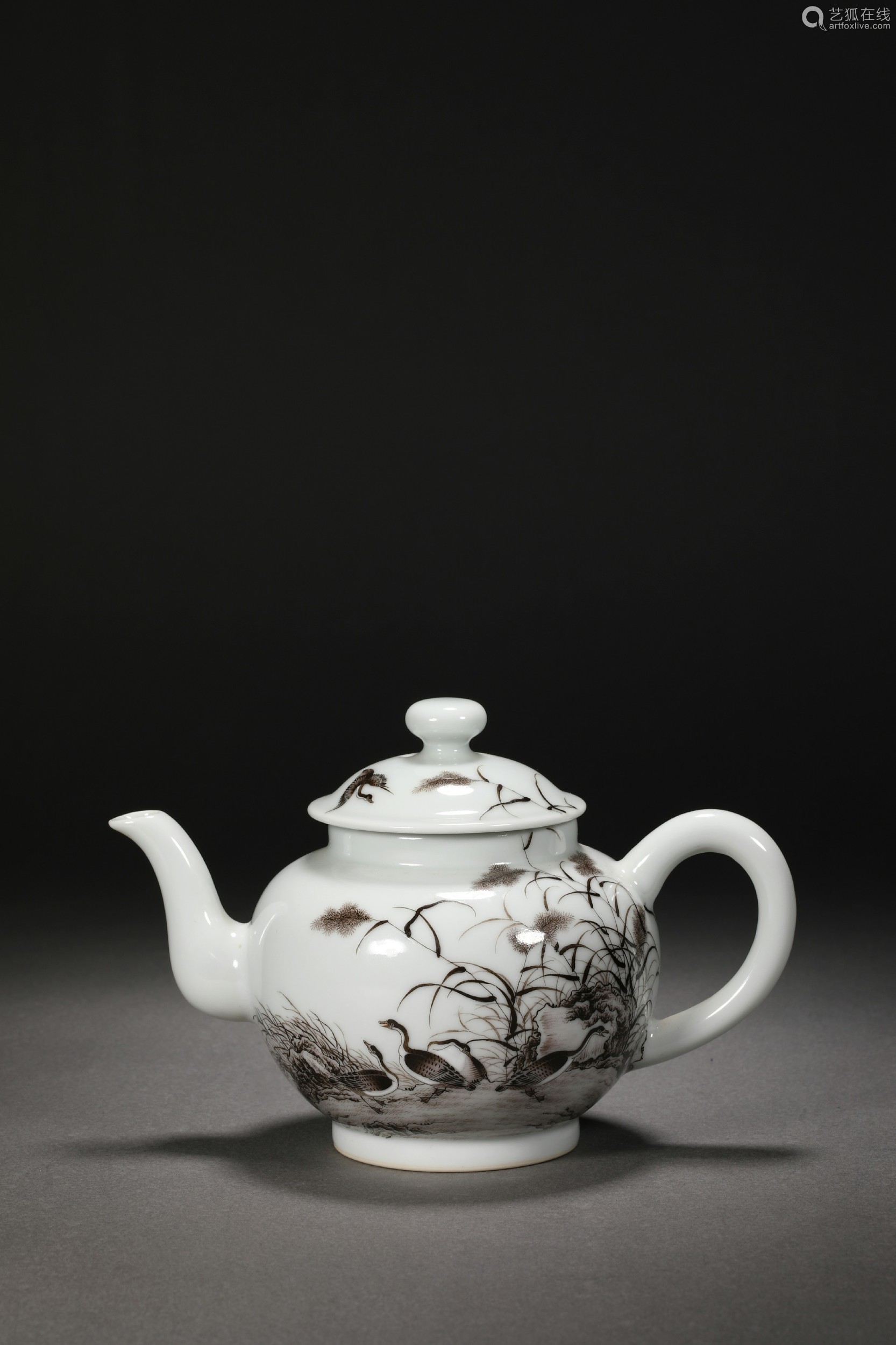 Teapot with flower and bird pattern