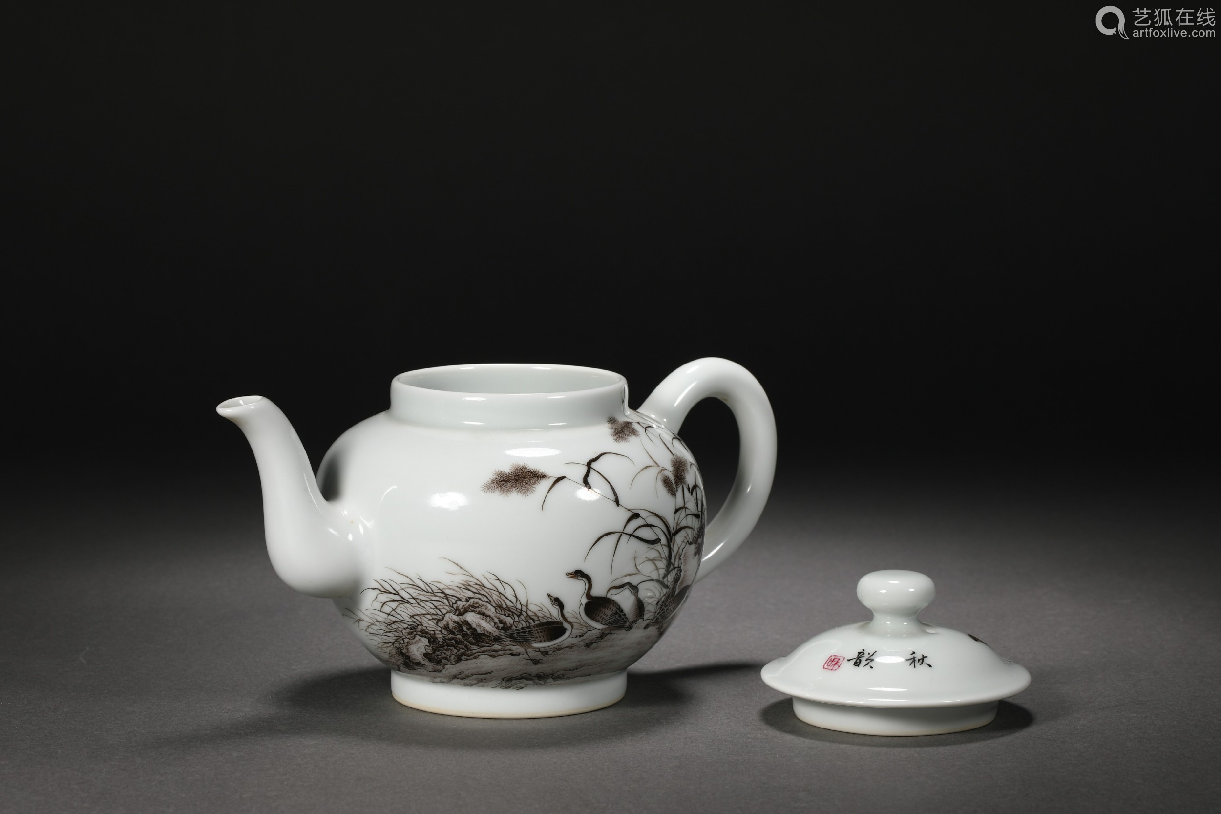 Teapot with flower and bird pattern