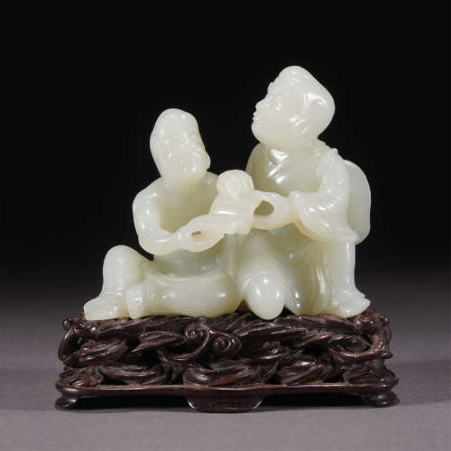 A WHITE JADE CARVED FIGURE OF BUDDHA ,QING