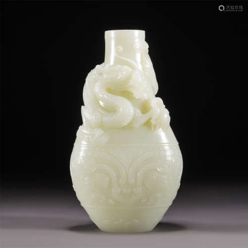 A WHITE JADE CARVED DRAGON VASE,QING