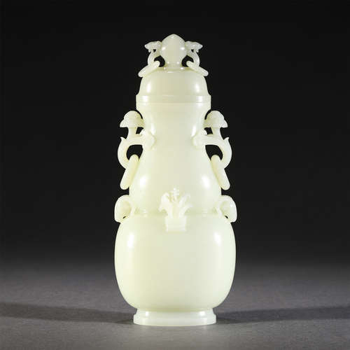 A JADE LIDDED VASE