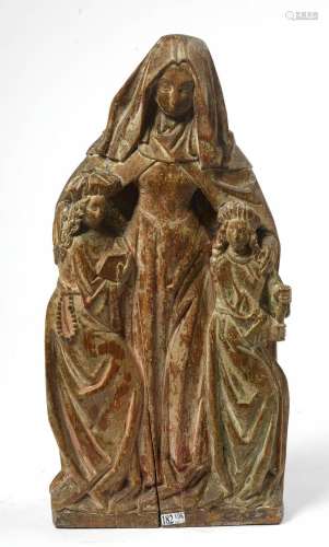 "Sainte Anne trinitaire" en chêne sculpté portant ...