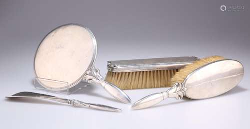 A DANISH STERLING SILVER DRESSING TABLE SET, by Georg Jensen...