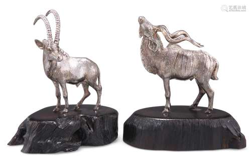 A STERLING SILVER KUDU BULL AND SABLE BULL, by Patrick Mavro...