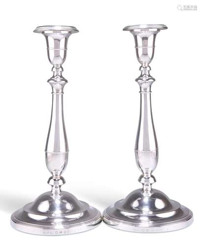 A PAIR OF GEORGE III SILVER CANDLESTICKS, by Nathaniel Smith...