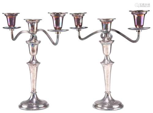 A PAIR OF GEORGIAN-STYLE SILVER THREE-LIGHT CANDELABRA, by E...