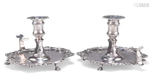 A PAIR OF GEORGE II SILVER CHAMBERSTICKS, by William Cafe, L...