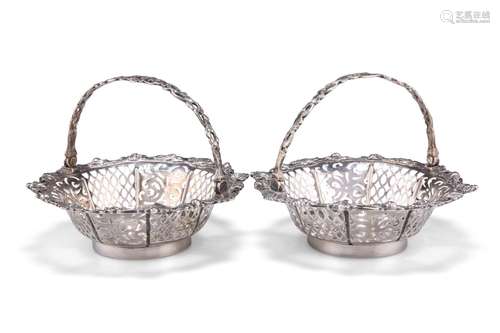 A PAIR OF GEORGE III SILVER BASKETS, by Thomas Bumfriss &...