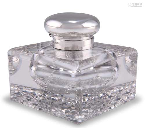 A GEORGE V SILVER-TOPPED CUT-GLASS INKWELL, by S Blanckensee...