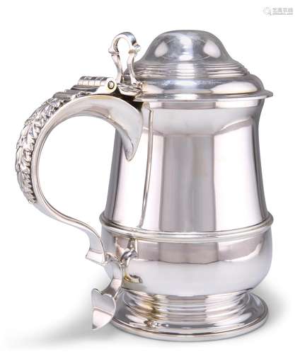 A GEORGIAN-STYLE SILVER LIDDED TANKARD, by Garrard & Co ...