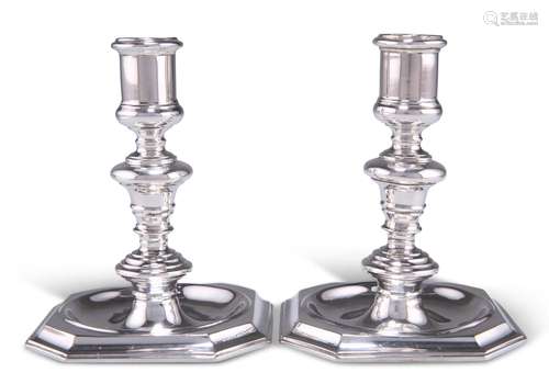 A PAIR OF ELIZABETH II SILVER CANDLESTICKS, by Israel Freema...